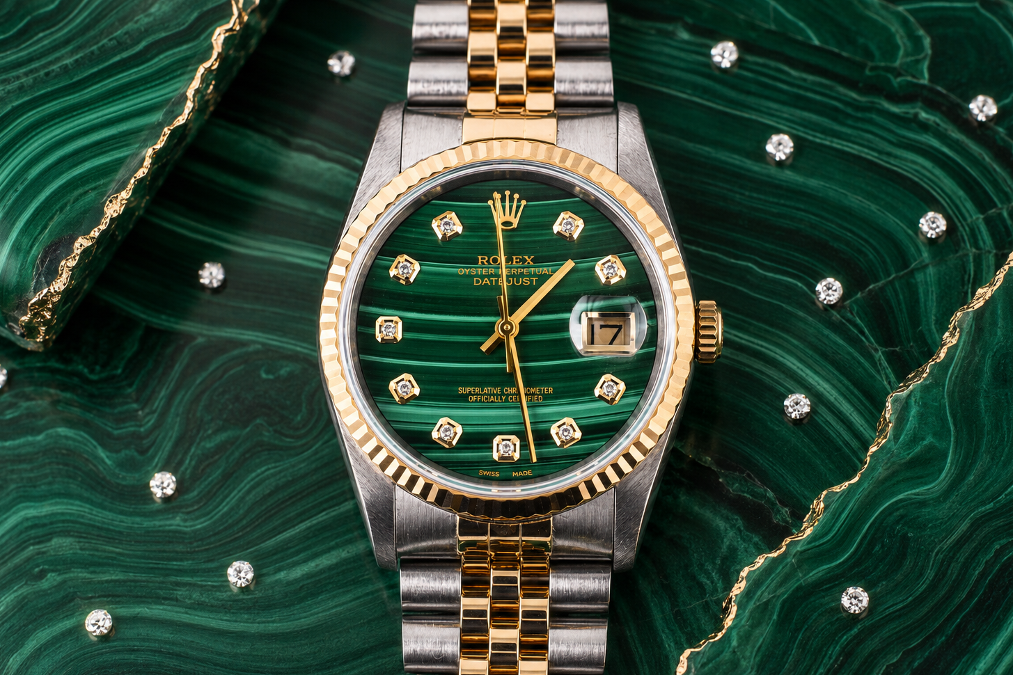 Luxury watch with green face and gold accents on a green textured background