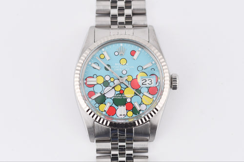 Watch with a colorful face on a white background