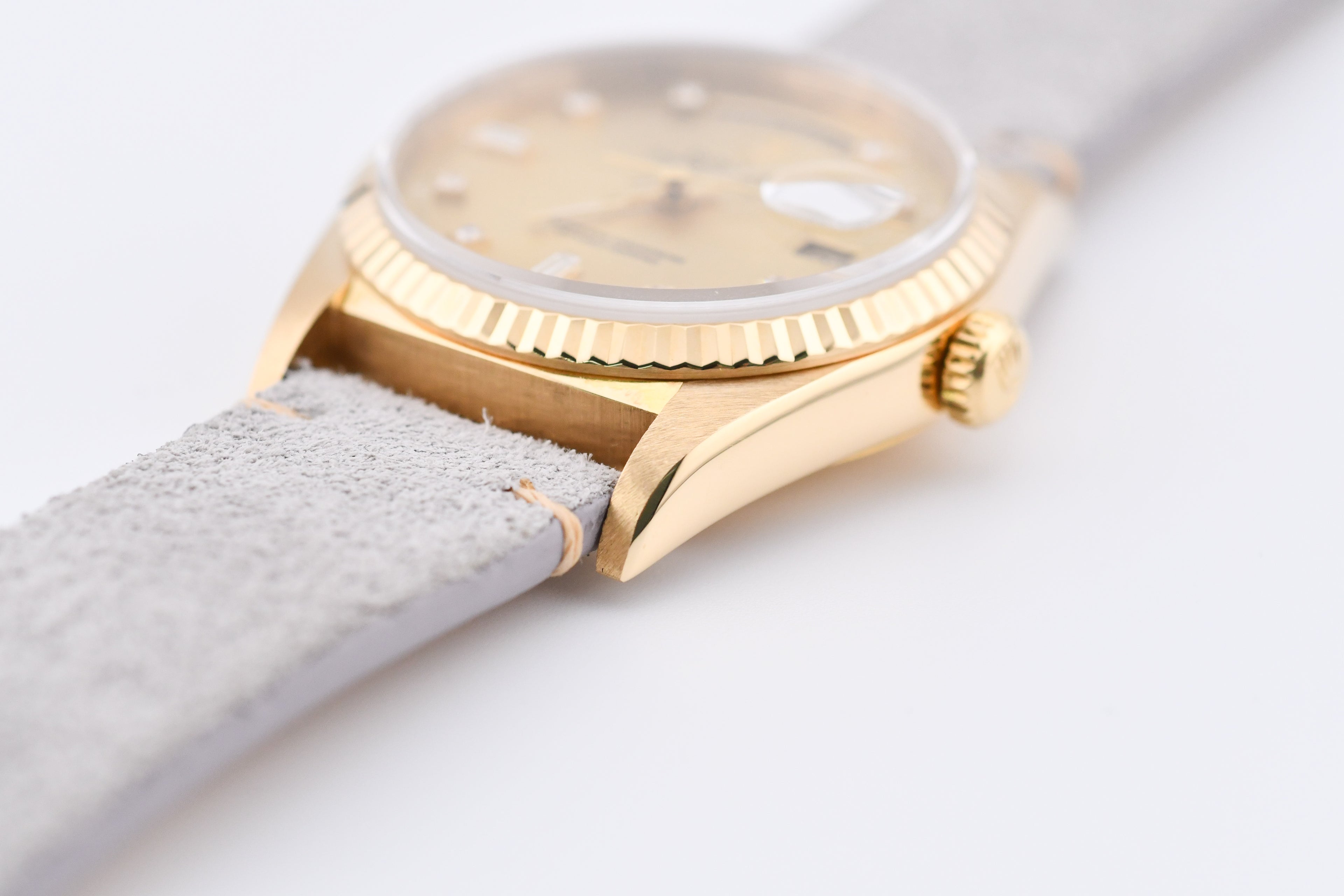 Rolex Day-Date 36mm Ref 18038 Champagne Baguette Diamond Dial Gray Strap