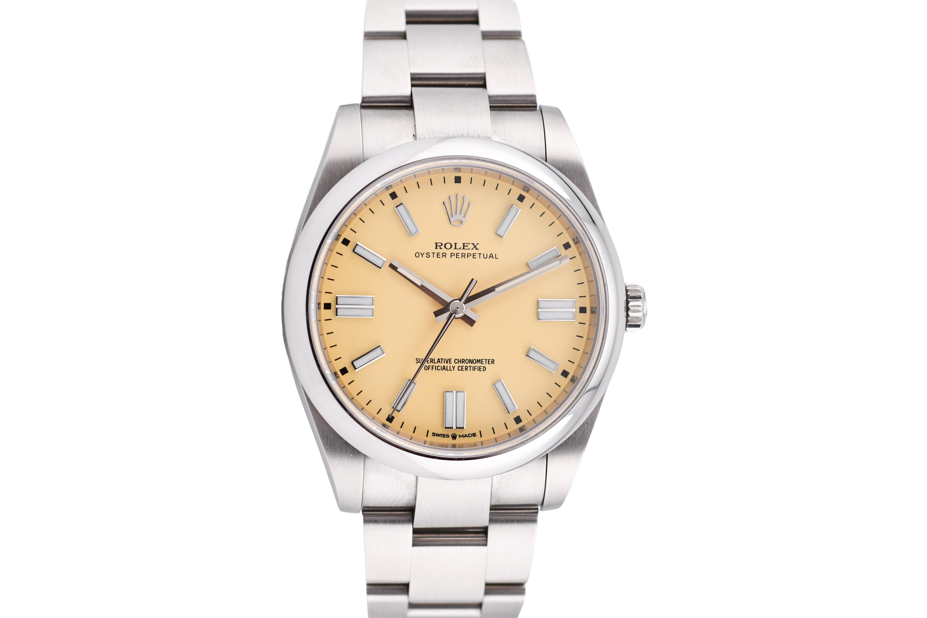 Silver watch with a beige dial on a light gray background