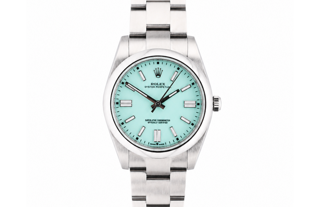Silver watch with a light blue face on a white background